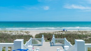 A wooden deck leading to a beach with a clear view of the ocean. - 5BR, Ocean Front, 1/2 Duplex! (Emerald Isle)