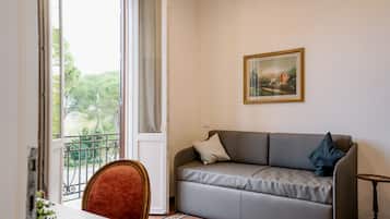 Panoramic Suite | Living area | 40-inch LED TV with digital channels