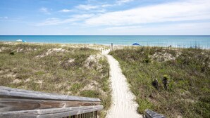 A sandy beach path leading to the ocean with a wooden fence on the left. - POOL & DOGS WELCOME! Easy Beach Access (Emerald Isle)