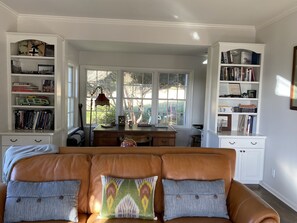 TV, fireplace, books, offices