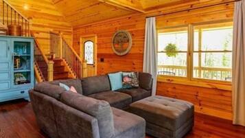 Smart TV, fireplace, books, computer monitors