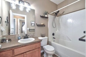 Shower, hair dryer, towels, shampoo