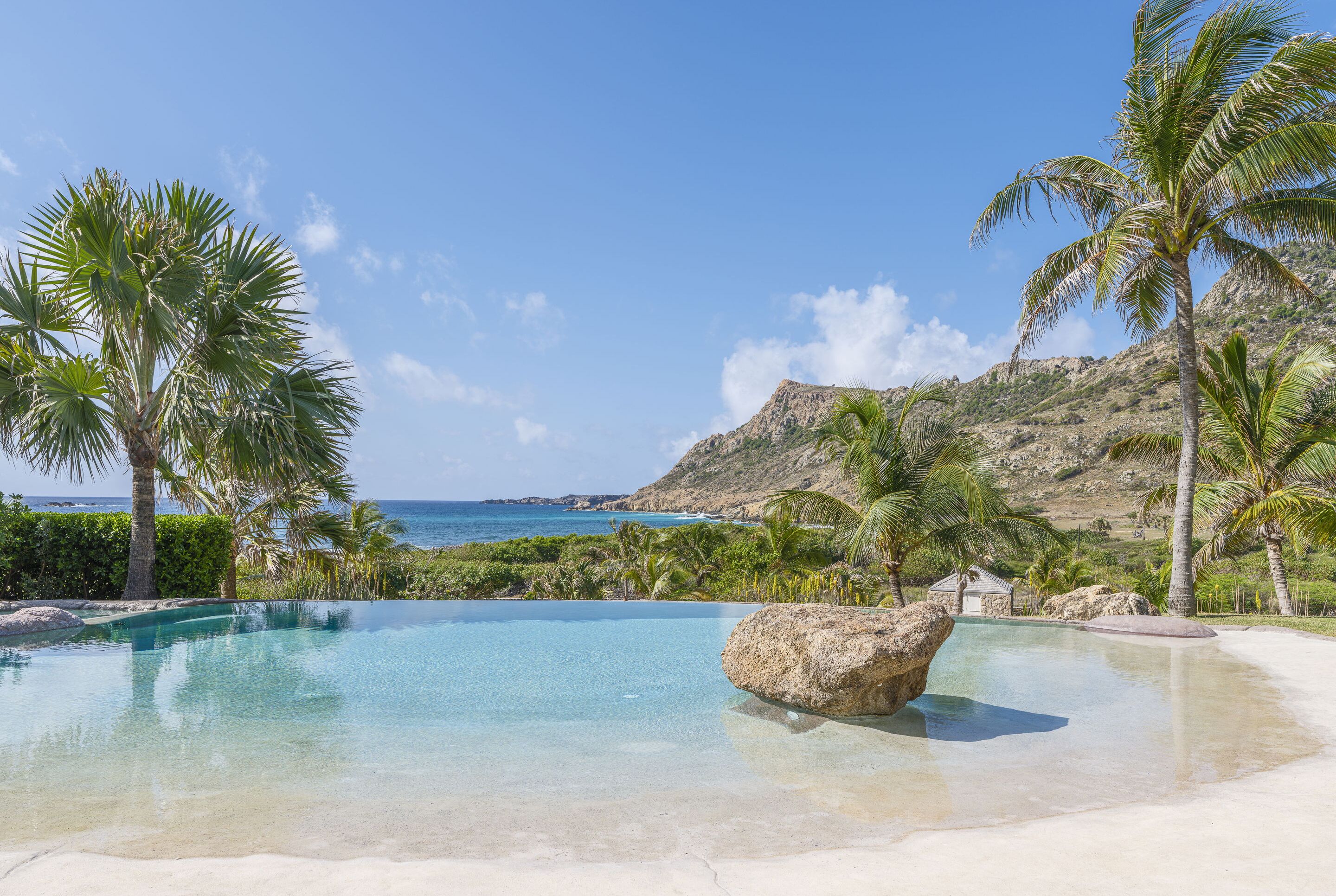 Nice heated pool, sunny expansive terrace with loungers and deck chairs.