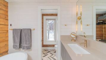 Shower, hair dryer, towels, toilet paper