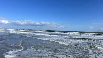 On the beach, sun-loungers, beach towels