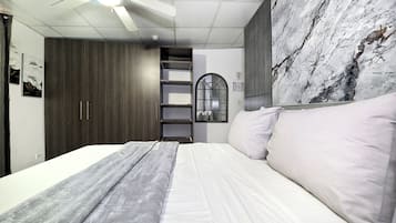 Blackout curtains, iron/ironing board, free WiFi, bed sheets