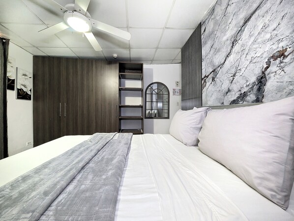 Blackout curtains, iron/ironing board, free WiFi, bed sheets