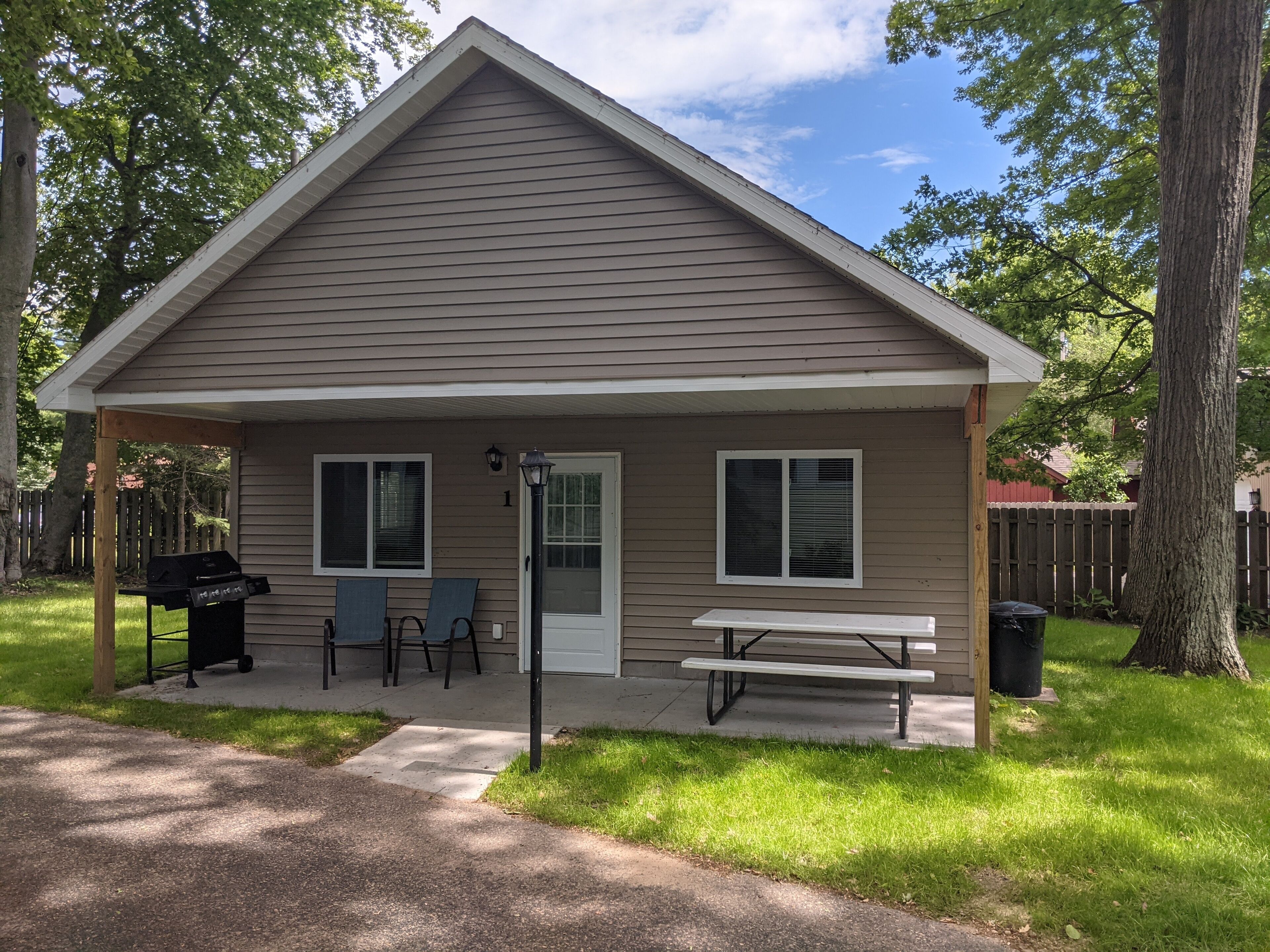 Cozy 3-bedroom cabin with lake view and access.