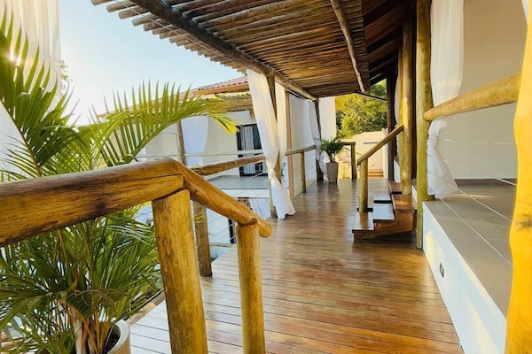 Deluxe Suite, Jetted Tub, Sea View | Terrace/patio