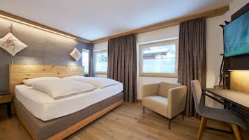 Classic Suite | Down comforters, in-room safe, individually decorated