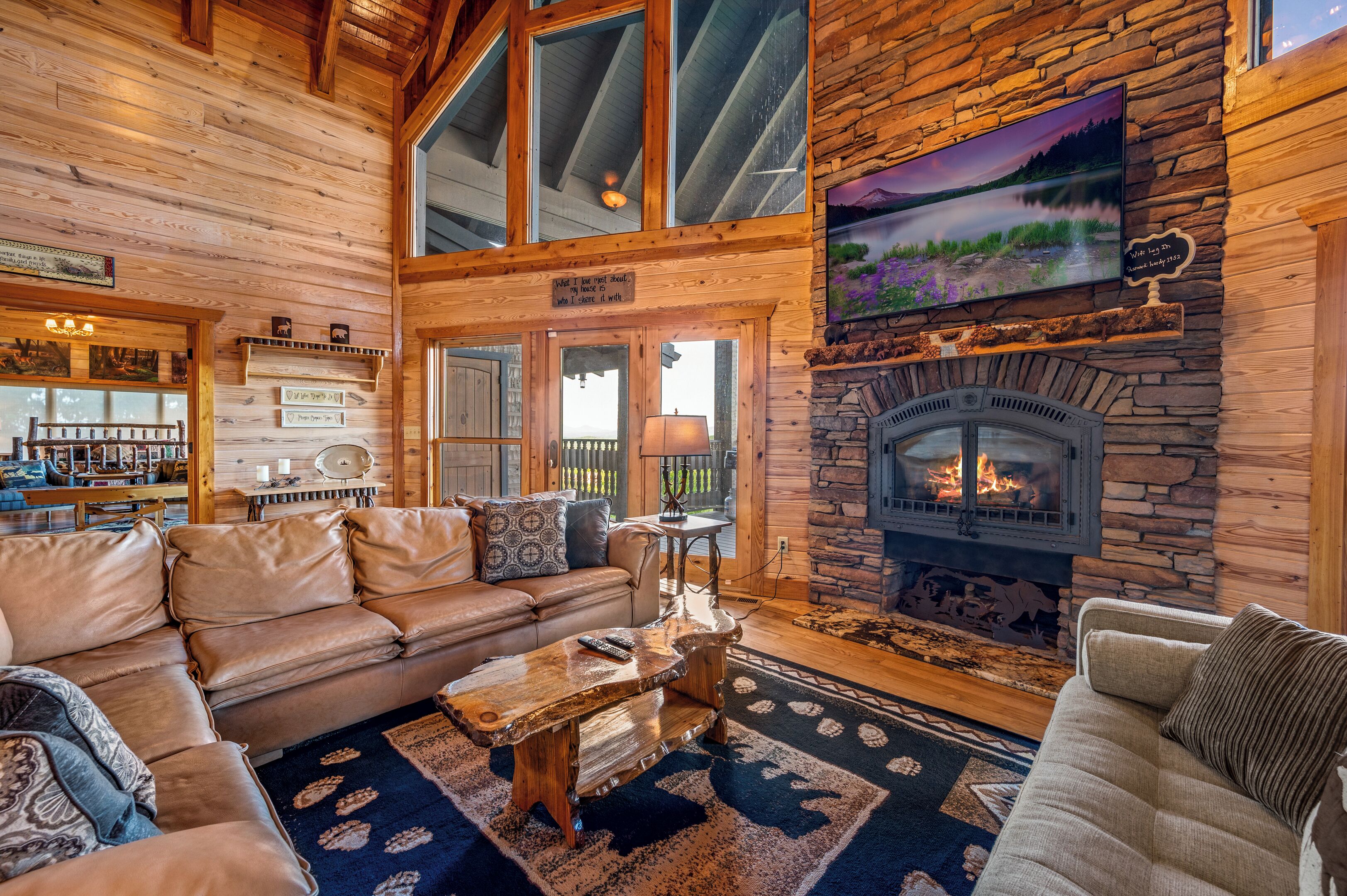 Luxury Cabin | Living area | 72-inch flat-screen TV with digital channels, fireplace