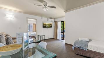 Family Suite | Living area | 42-cm LCD TV with cable channels