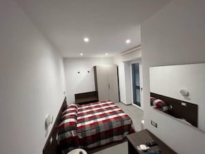Desk, free WiFi, bed sheets