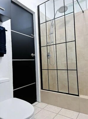 Shower, hair dryer, towels, soap