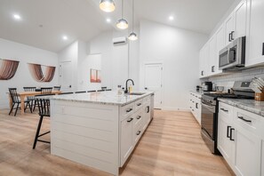 Fridge, microwave, oven, stovetop - Two homes in one! Beautiful Courtyard with Pool! (Hurricane)