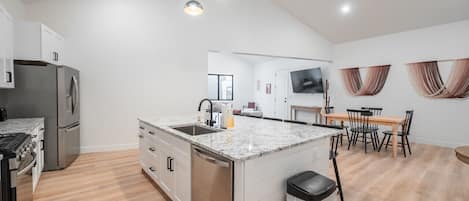 Coffee/tea maker, fridge, microwave, oven