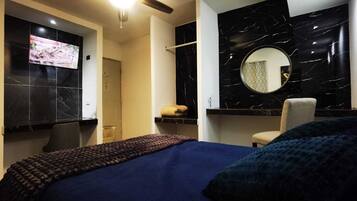 Basic Single Room | Premium bedding, down comforters, pillowtop beds, individually decorated