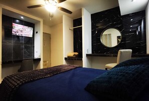 Basic Single Room | Premium bedding, down comforters, pillowtop beds, individually decorated