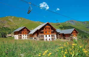 Experience the charm of the Alps in this traditional chalet-style hotel, offering stunning views and easy access to ski facilities.