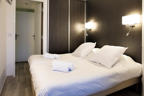 2 habitaciones, wifi gratis y ropa de cama