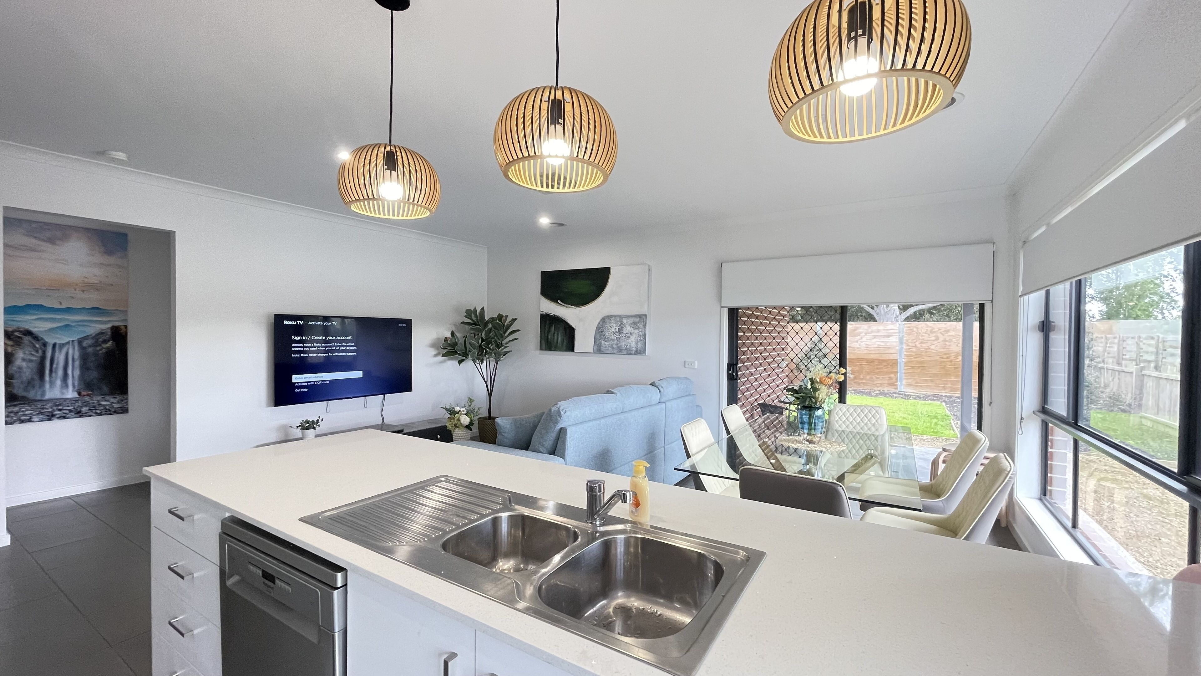 Family House | Living area | 65-inch flat-screen TV with digital channels