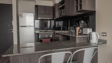 Apartamento família | Cozinha privada | Cozinha com ilha