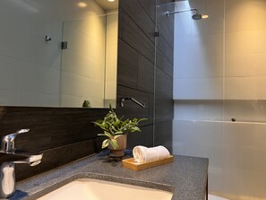 Shower, towels, soap, shampoo