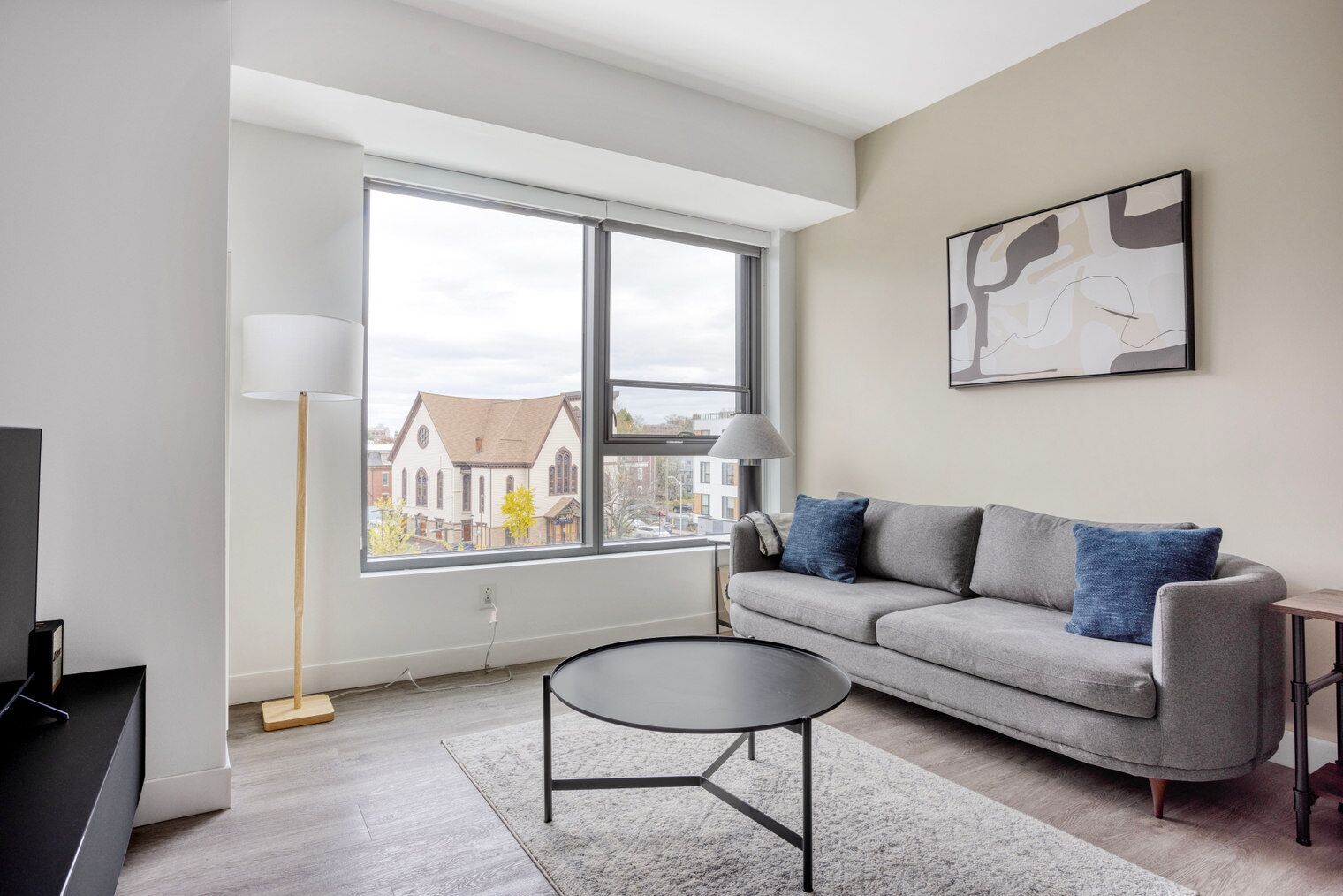 Sleek Central Square 1BR w/ Gym, W/D & Roof, near T, by Blueground