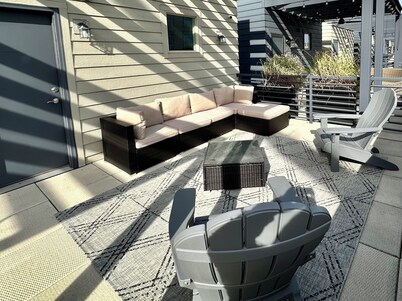 Luxury condo. 2 car garage, rooftop patio. Perfect for work or play! 