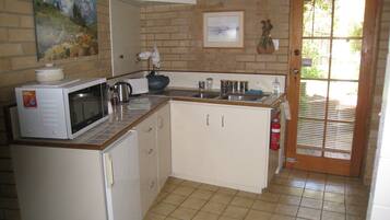 Fridge, microwave, electric kettle, toaster
