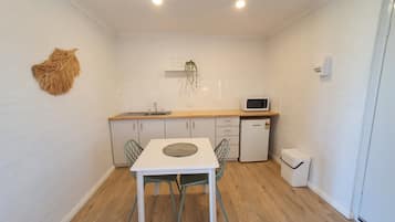 Premium Apartment | Living area | Flat-screen TV