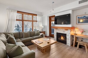 TV, fireplace - Prime Slope-Side Snowmass Condo! Heart Of Base Village, Shops & Dining. Hot Tubs, Fireplace, Balcony (Snowmass Village)
