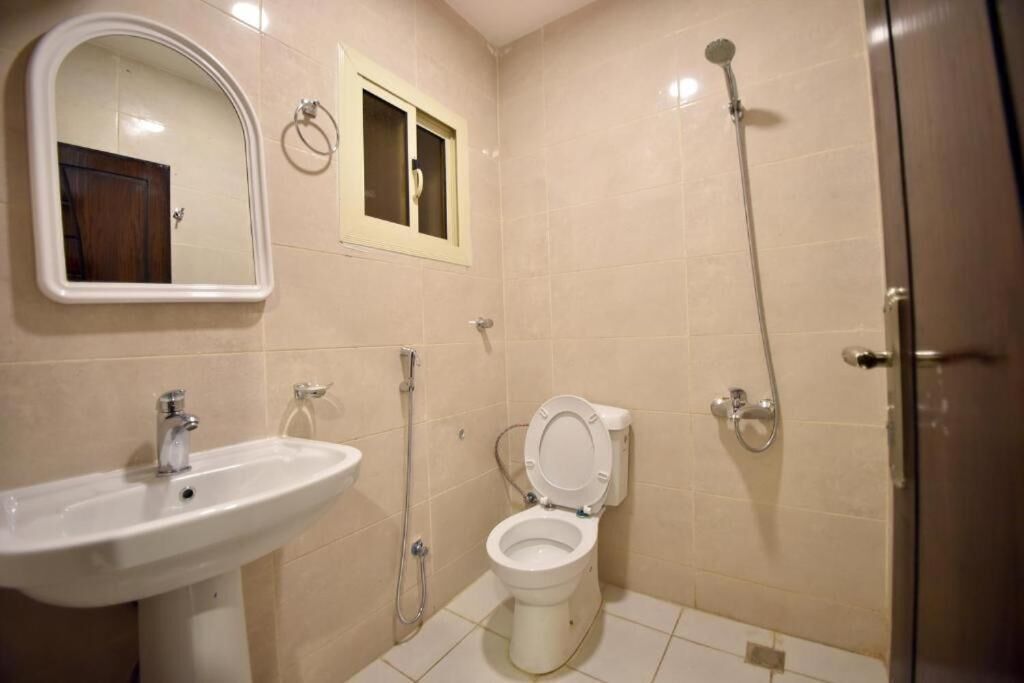 shower, rainfall showerhead, hair dryer, slippers