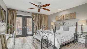 1 bedroom, desk, iron/ironing board, travel crib