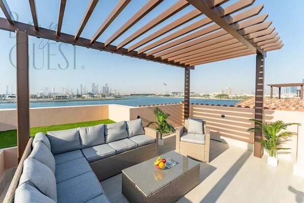 Terrace/patio - Peaceful And Tranquil Setting in a 4BR Villa in Sur La Mer (Dubai)