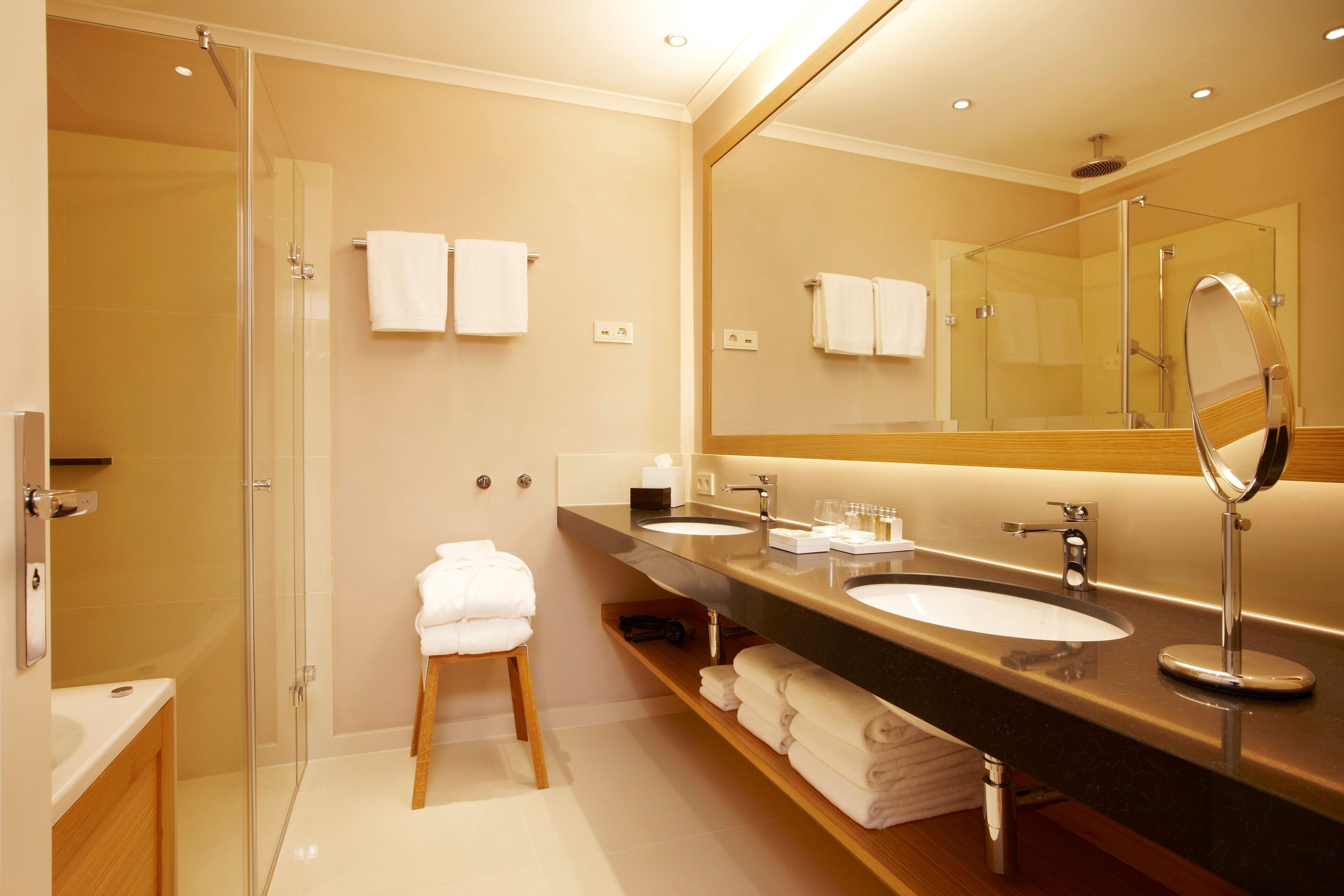 Junior Suite | Bathroom | Rainfall showerhead, free toiletries, hair dryer, bathrobes