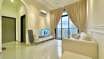 Appartement Confort, 2 chambres, non-fumeur | Aire de séjour | Téléviseur connecté de 42 po avec télévision par câble, Netflix