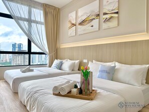 Comfort studio, 2 queensize bedden, uitzicht op de stad | Een strijkplank/strijkijzer, gratis wifi, beddengoed