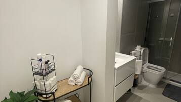 Shower, towels, soap, shampoo