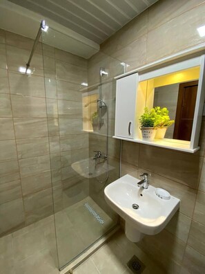 Apartment | Bathroom | Shower, hair dryer, towels, toilet paper - Brand new 2 Bedroom Apartment in the Center Skopje (Skopje)