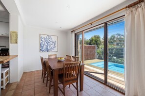 Dining - Victoria’s Poolside Emerald Beach stay with Shared Pool, Near Beach and Cafes. (EMERALD BEACH)