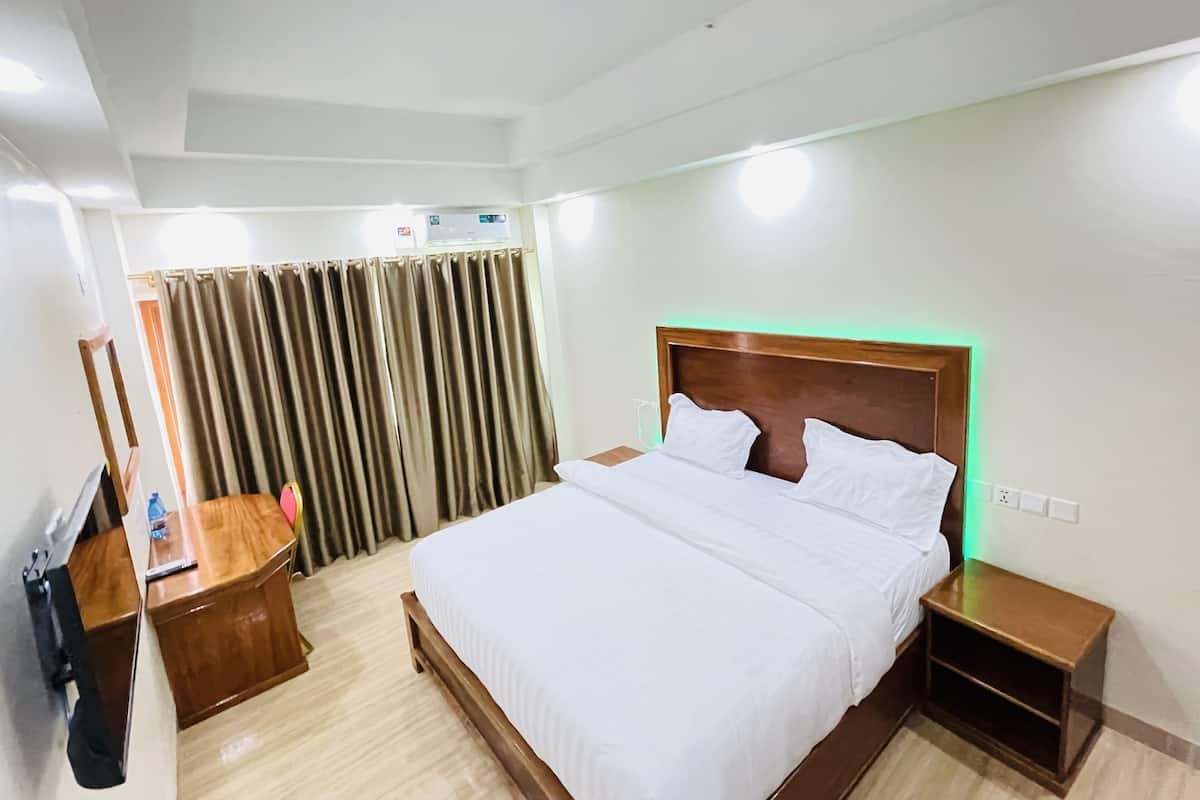 Habitación ejecutiva con 1 cama matrimonial o 2 individuales | Ropa de cama hipoalergénica y decoración personalizada