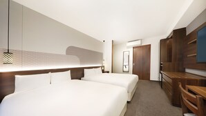 A hotel room with two beds, a desk, a chair, a TV, and a wardrobe. - Hop Inn Kyoto Shijo Omiya (Kyoto)