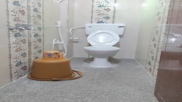 Shower, rainfall showerhead, towels