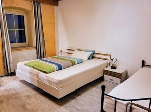 3 bedrooms, desk, iron/ironing board, travel cot