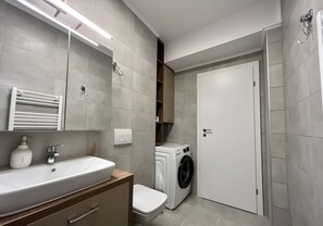 Hair dryer, towels, soap, toilet paper
