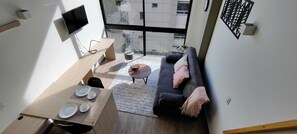 32-inch flat-screen TV with digital channels, Netflix - Elegante Loft en Chapinero (Bogotá)