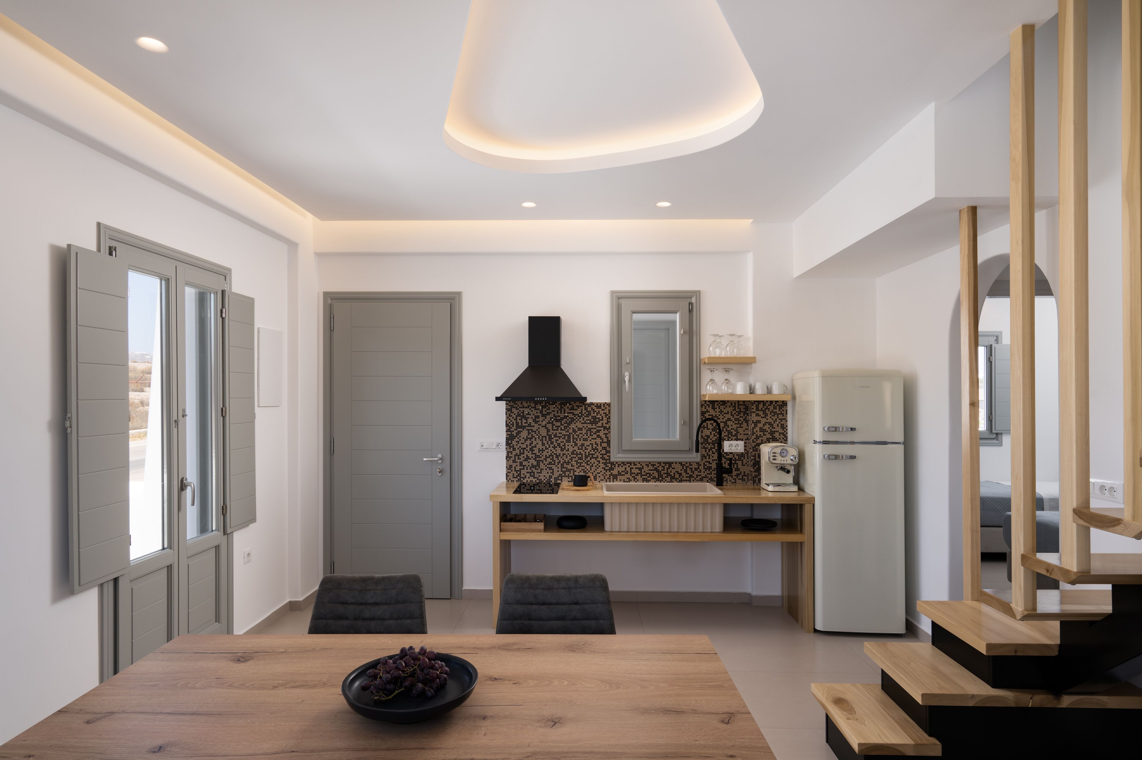 white diamond suite with hot tub | private kitchen | fridge, stovetop, espresso maker, electric kettle