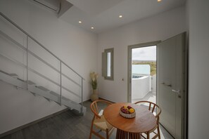 Gold Diamond Suite with Hot Tub | Living area | 32-inch Smart TV with digital channels - Aegean Diamonds Luxury Suites (Santorini)