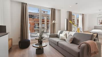 Apartament | Sala d'estar | Televisor de 50 polzades amb canals per satèl·lit